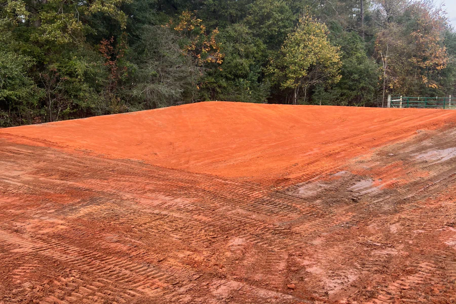 Building pad preparation and grading for a Texas property